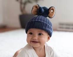 Baby Navy Pom Beanie With Elephant Love Pom -Love Your Melon 007 Sami Weaver CarynAgency ImageUsageExpires09 25 2022 rasun 33ed316e 0cec 42d6 b3f1 339acb76e798