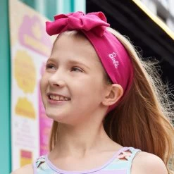 Pre-Order Kids Barbie™ Magenta Hero Headband -Love Your Melon LYM.Barbie.65.Anniversary.3.24.eCom .Kids .Magenta.Bow .Heaadband.PDP .4
